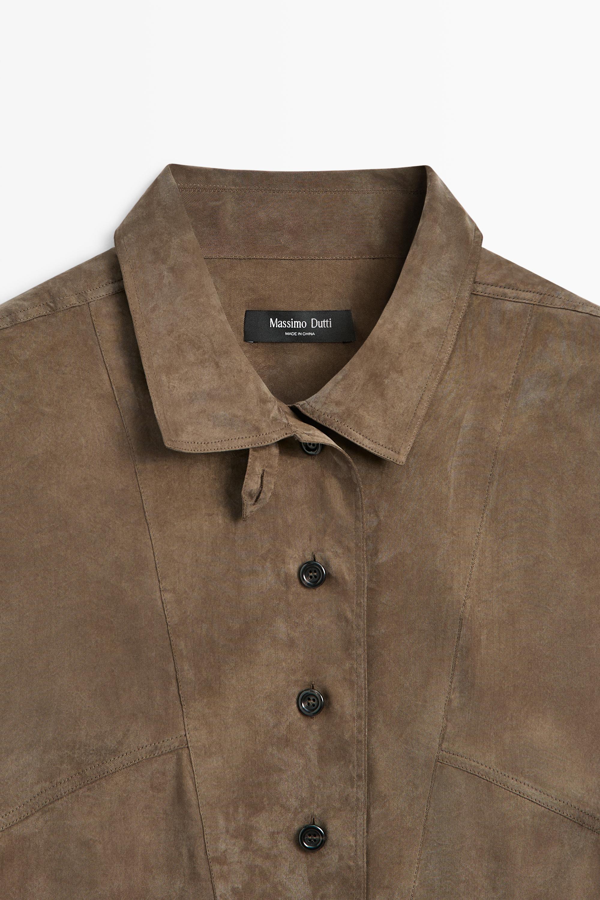 Flowing shirt with stand collar and bib detail